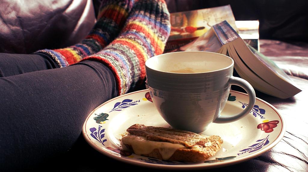Local artisan crafting traditional pottery in workshop with natural lighting