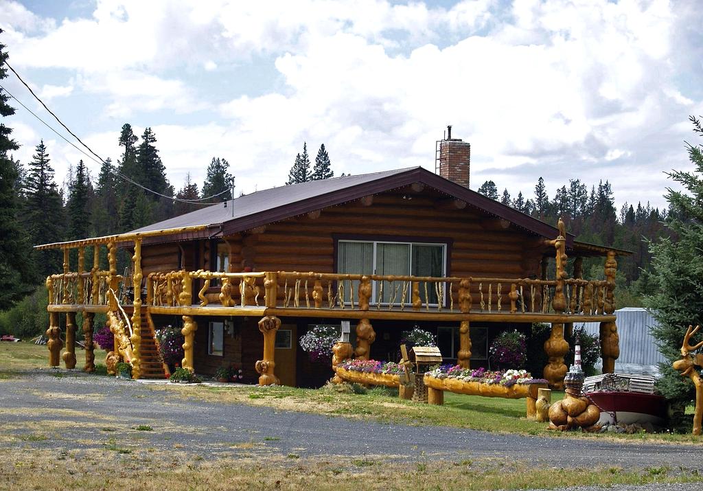 Cozy cabin interior with warm lighting and rustic décor