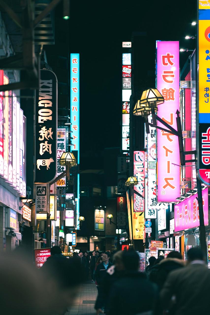 Street market with local vendors and colorful stalls in charming town