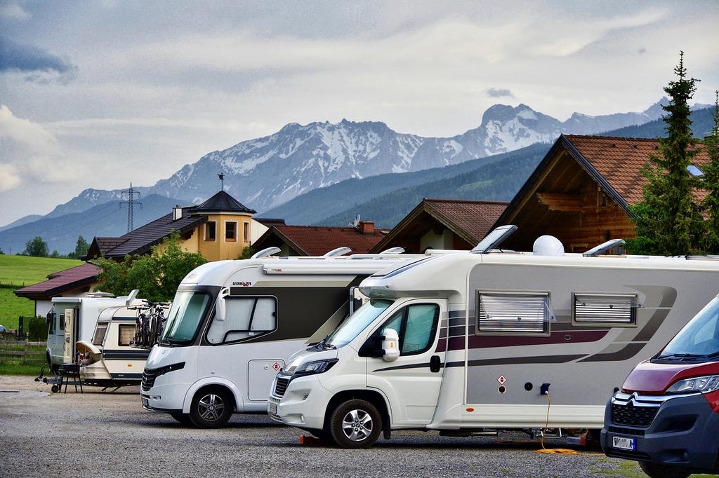 Traveler looking at scenic mountain view with map in hand
